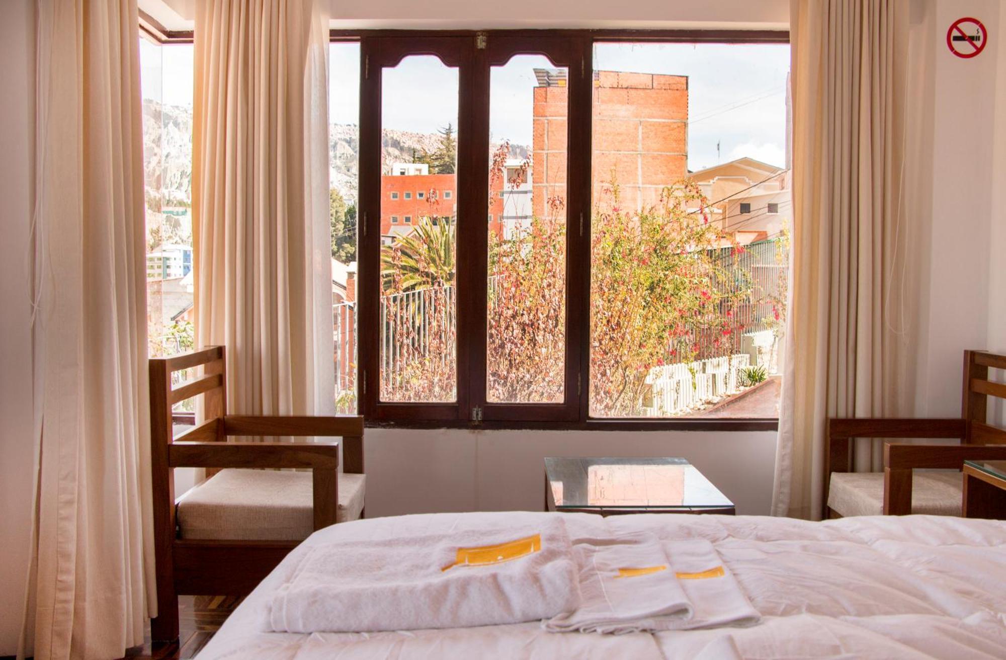 Qhini Hotel Boutique La Paz Bilik gambar